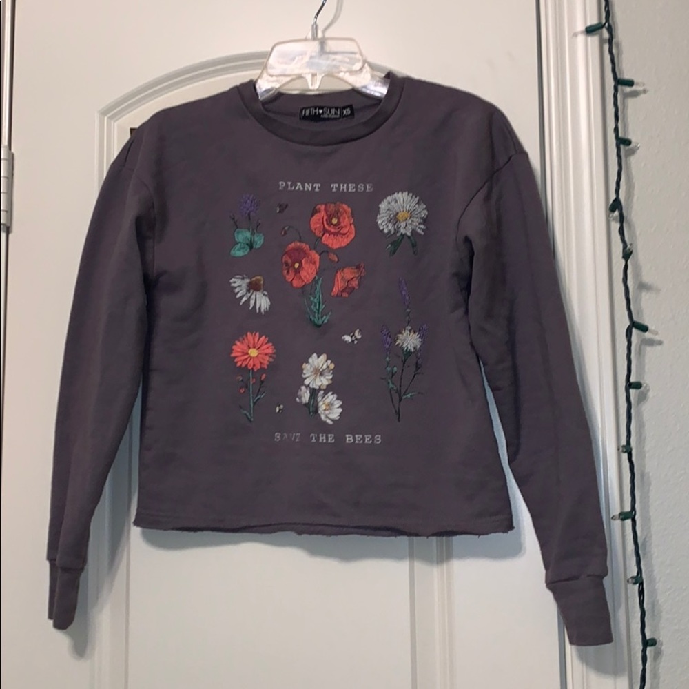 A dark purple sweater